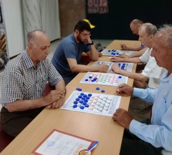 В Енотаевке прошел турнир за звание экс-чемпиона по шашкам